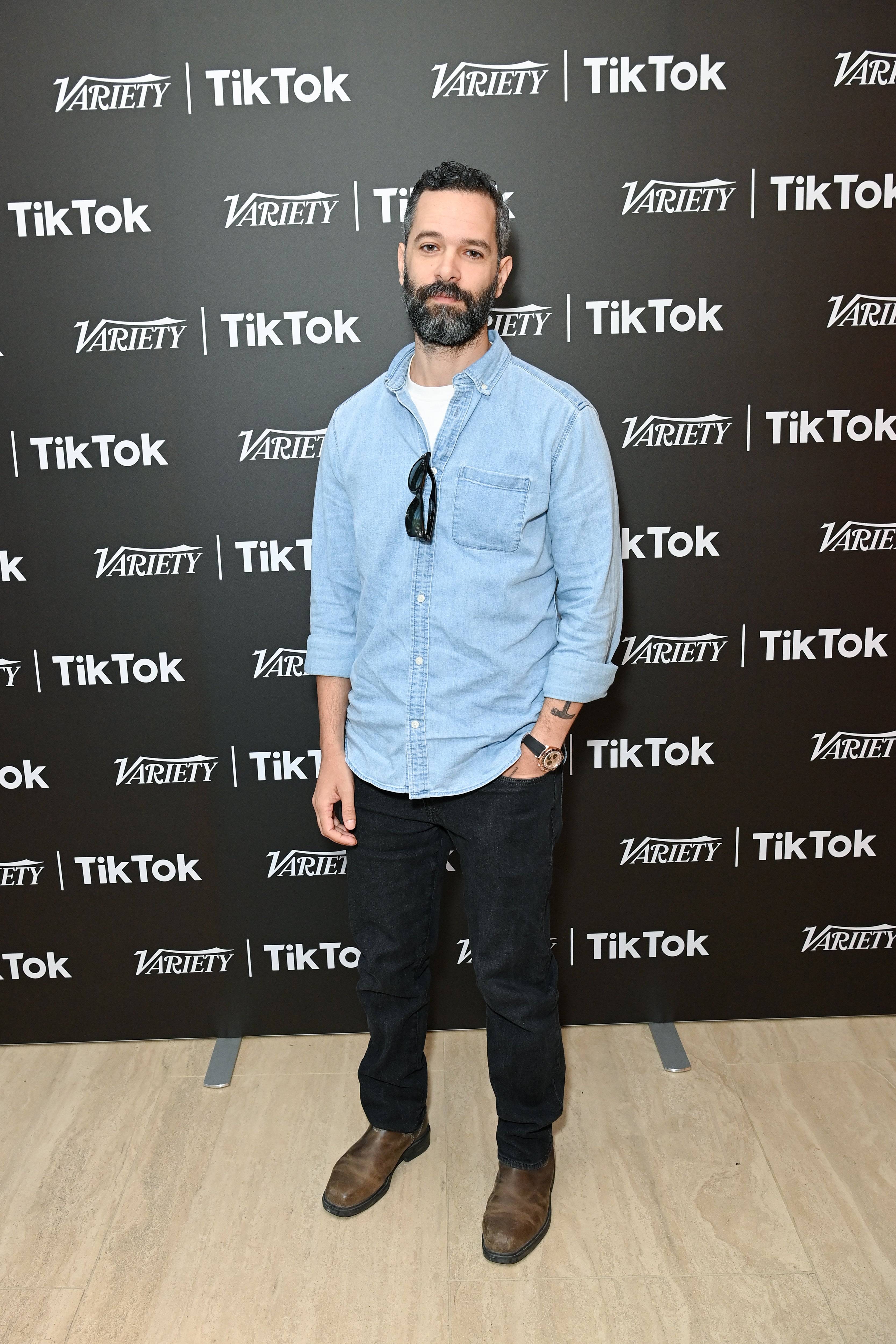 Neil Druckmann at industry event